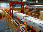Systém pro přepravu balíků skelné vaty